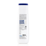 The back of a tall white plastic bottle with a dark blue cap