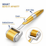A gold and silver derma roller shown on a white background 